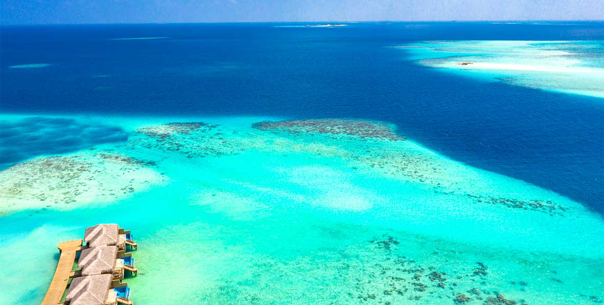 water villas, laguna y oceano en You and Me Maldives