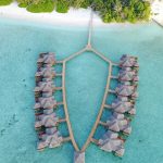 water villas y playa de Fihalhohi Island Resort