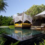 cama balinesa en One & Only Reethi Rah Maldives